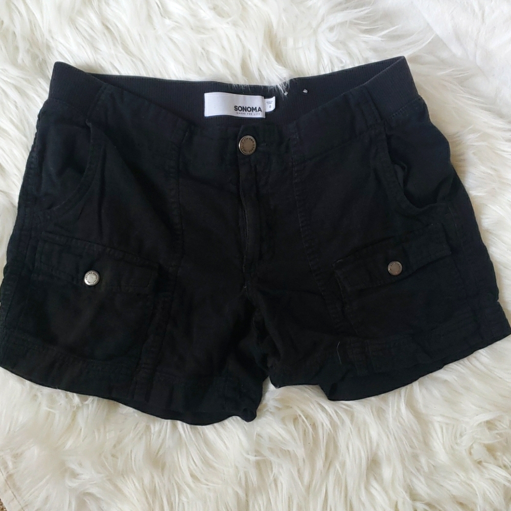 Black baggy cargo pocket shorts